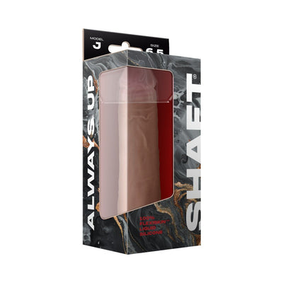 Packaging box of Shaft Model J 6.5-inch liquid silicone dildo in realistic skin tone with black and marble design.