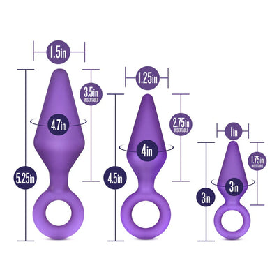 Three purple silicone anal training plugs in small, medium, and large sizes with measurement labels and ring handles.