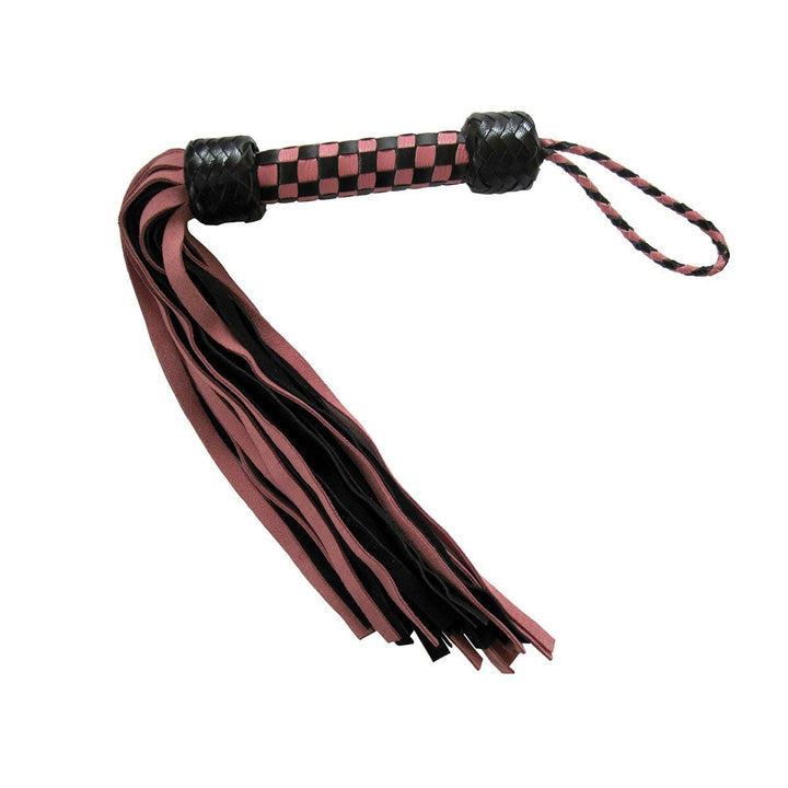 Short suede flogger with pink and black tails and a woven handle with wrist loop.