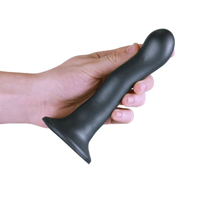 Hand holding a black 7-inch ultra-soft silicone curvy G-spot dildo with a strong suction cup base.