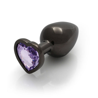 Large gunmetal metal plug with a heart-shaped amethyst-colored jewel base on a white background.