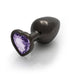 Large gunmetal metal plug with a heart-shaped amethyst-colored jewel base on a white background.