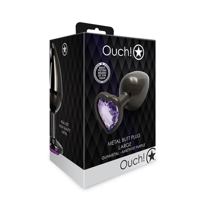 Packaging box of Shots Ouch! large gunmetal metal butt plug with amethyst purple heart-shaped jewel base.