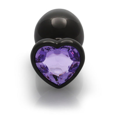 Large gunmetal metal butt plug with a heart-shaped amethyst jewel base, smooth and tapered for comfortable use.