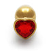 Medium gold aluminum butt plug with a red heart-shaped jewel base on a white background.