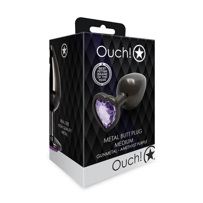 Packaging box of Shots Ouch! medium gunmetal metal butt plug with amethyst purple heart-shaped jewel base.
