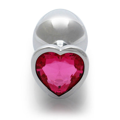Medium silver metal butt plug with a heart-shaped pink gem base, smooth and tapered for comfortable use.