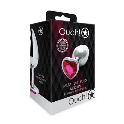 Packaging box of Ouch! medium metal butt plug with silver finish and pink heart-shaped gem base