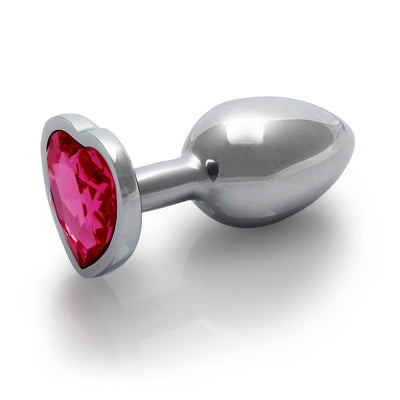 Small silver metal butt plug with a heart-shaped pink gem base, smooth tapered design for comfortable use.