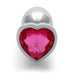 Small silver metal butt plug with a heart-shaped pink gem base, smooth tapered design for comfortable use.