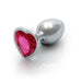Small silver metal butt plug with a heart-shaped pink gem base, smooth and tapered for comfortable use.