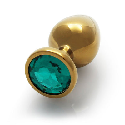 Large gold-toned metal plug with a smooth finish and a round teal gem at the base.