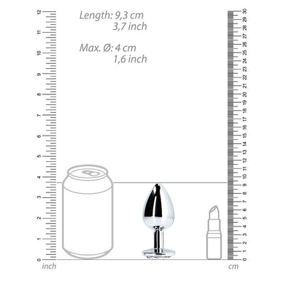 Metallic large round gem butt plug shown next to a soda can and lipstick for size comparison with measurement scales.
