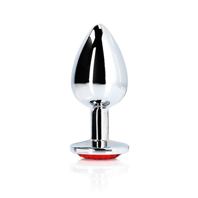 Large polished metal butt plug with a tapered tip and red jewel base for secure and stylish wear.