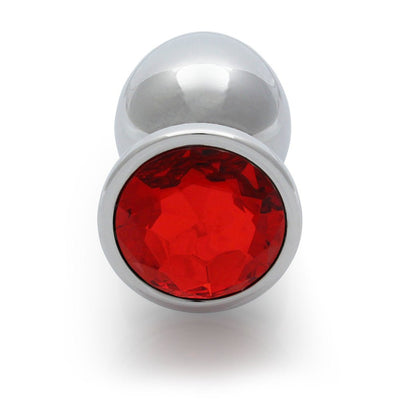 Large smooth metal butt plug with a round red gem base, polished silver finish, and tapered tip for easy insertion.