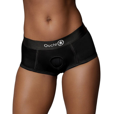 Black mid-rise vibrating strap-on brief with O-Ring system worn on model, featuring elastic waistband with Ouch! logo.