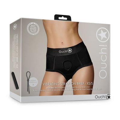 Packaging of Shots Ouch Vibrating Strap On Brief in black with mid-rise fuller cut design shown on model.