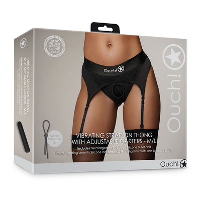 Packaging of Shots Ouch vibrating strap-on thong with adjustable garters shown on model wearing black size M/L