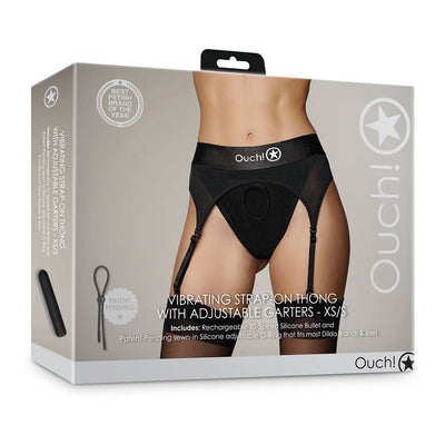 Packaging of Shots Ouch vibrating strap-on thong with adjustable garters in black, size XS/S, featuring a rechargeable silicone bullet.