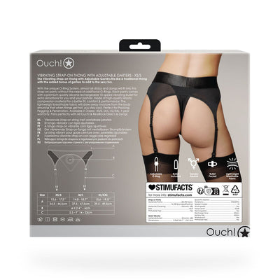 Back view of model wearing black vibrating strap-on thong with adjustable garters shown on product packaging.