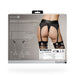 Back view of model wearing black vibrating strap-on thong with adjustable garters shown on product packaging.