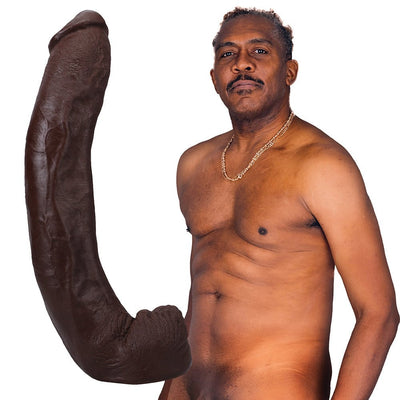 Lifelike 13.5-inch chocolate-colored ULTRASKYN dildo with textured veins and removable suction cup next to shirtless man.
