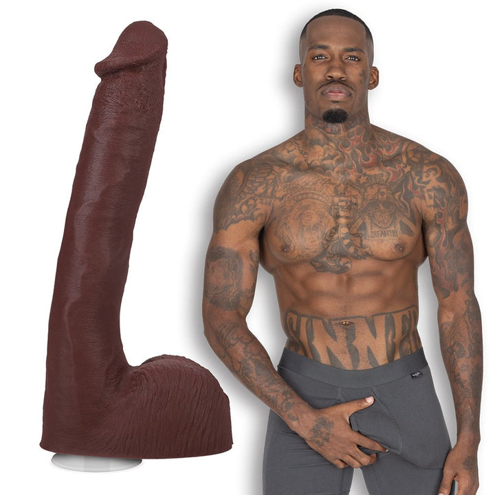 Dark brown lifelike 10-inch dildo with textured veins and suction base shown next to tattooed male model in gray underwear.