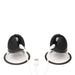 Pair of black and clear rotating silicone nipple suckers with USB charging cables attached.