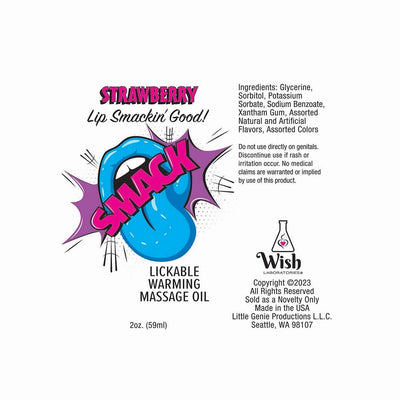 Smack Strawberry flavored lickable warming massage oil label with blue tongue graphic and product details.
