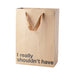 Kraft paper gift bag with brown ribbon handles and bold black text reading I really shouldn't have on the front.