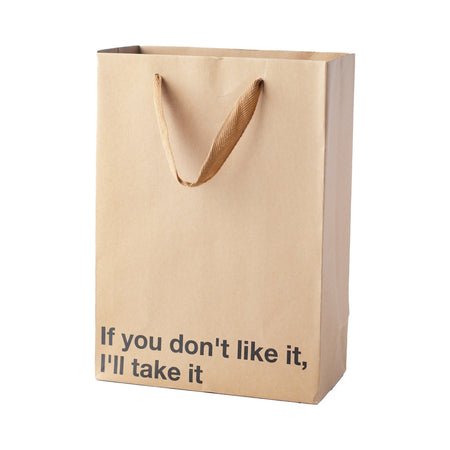 Kraft gift bag with brown ribbon handles and snarky text "If you don't like it, I'll take it" printed on front.