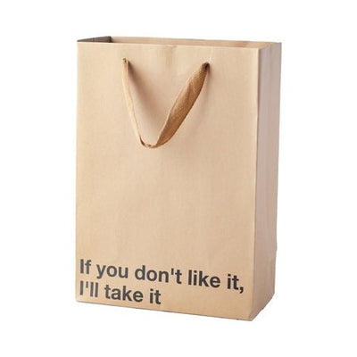 Kraft gift bag with brown ribbon handles and snarky text "If you don't like it, I'll take it" printed on front.