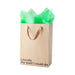 Kraft paper gift bag with brown ribbon handles and green tissue paper, printed with "Literally the least I could do" text.