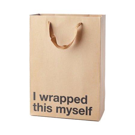 Kraft paper gift bag with brown ribbon handles and bold black text reading I wrapped this myself.