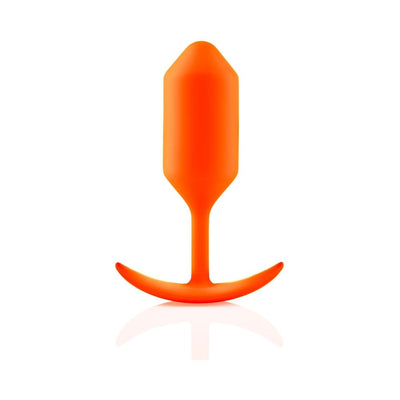 Orange seamless silicone weighted snug plug with a flexible neck and curved handle on a white background.