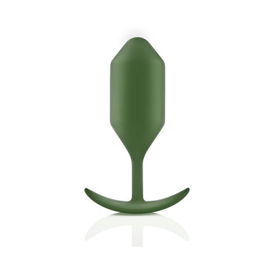 Green silicone weighted snug plug with tapered tip and curved base on white background