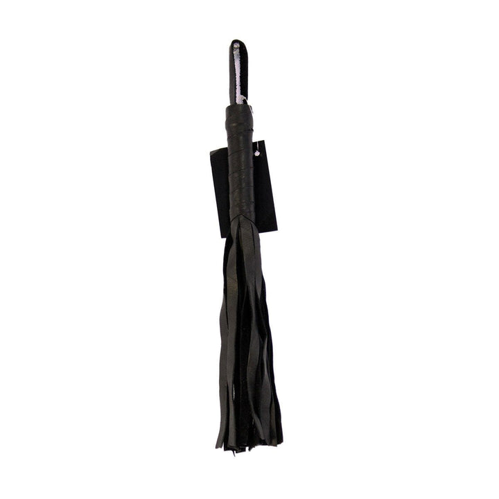 Black soft leather flogger with multiple tails and wrapped handle against a white background.