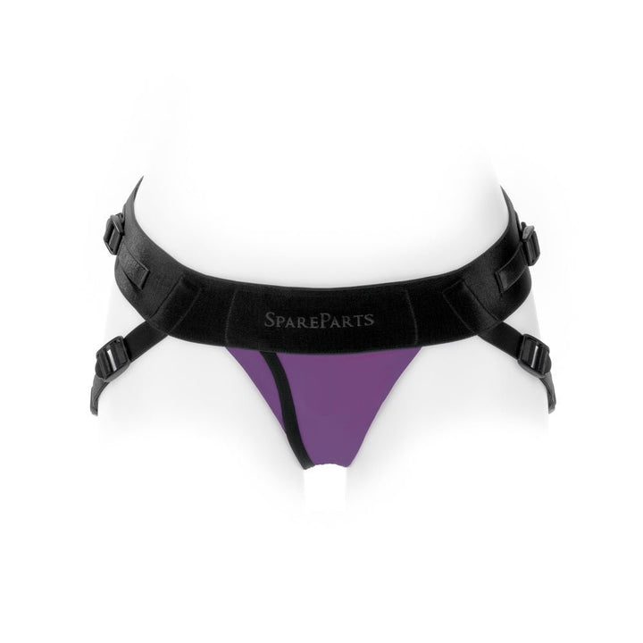 Purple jockey-style underwear harness with black adjustable double straps and SpareParts logo on waistband