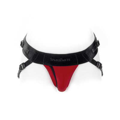Red nylon Joque Cover underwear harness with black adjustable double straps and SpareParts logo on front waistband.