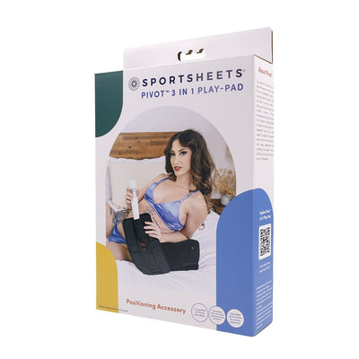 Packaging of Sportsheets Pivot 3 in 1 Play-pad showing a woman using the positioning accessory with a wand vibrator on a bed.
