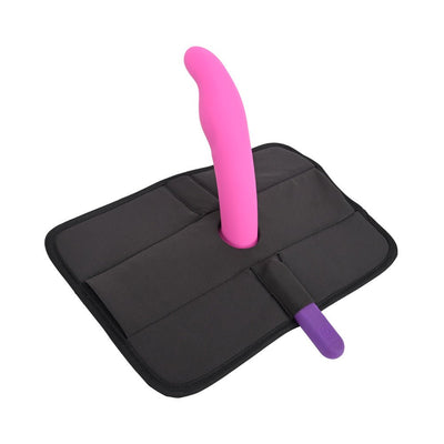 Black Sportsheets Pivot 3 in 1 Play-pad with pink curved dildo and purple bullet vibrator inserted for versatile positioning.