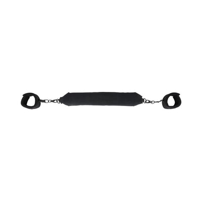 Black padded flexible positioning bar with attached adjustable cuffs on each end against white background