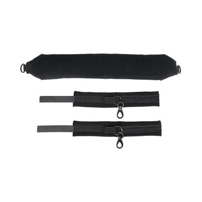 Black padded flexible positioning bar with two adjustable cuffs featuring metal clips on a white background.