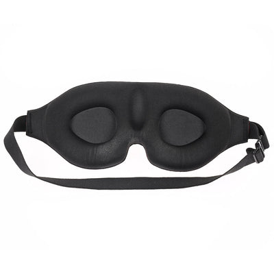 Black memory foam blindfold with contoured eye and nose divots and adjustable elastic strap for a comfortable fit.
