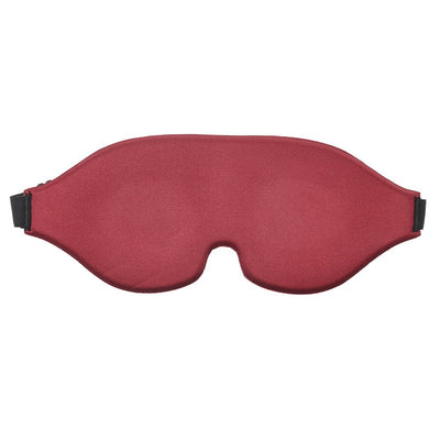 Red memory foam blindfold with contoured eye and nose divots and adjustable black elastic strap.