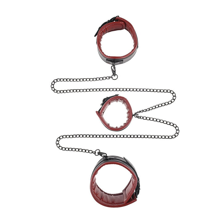 Red and black padded collar and cuffs connected by black metal chains in a 3-piece bondage restraint set.