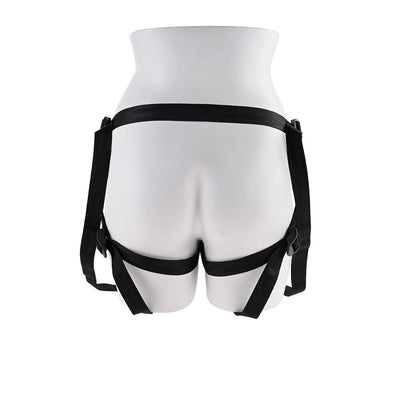 Adjustable black strap-on harness displayed on a white mannequin torso, shown from the back.