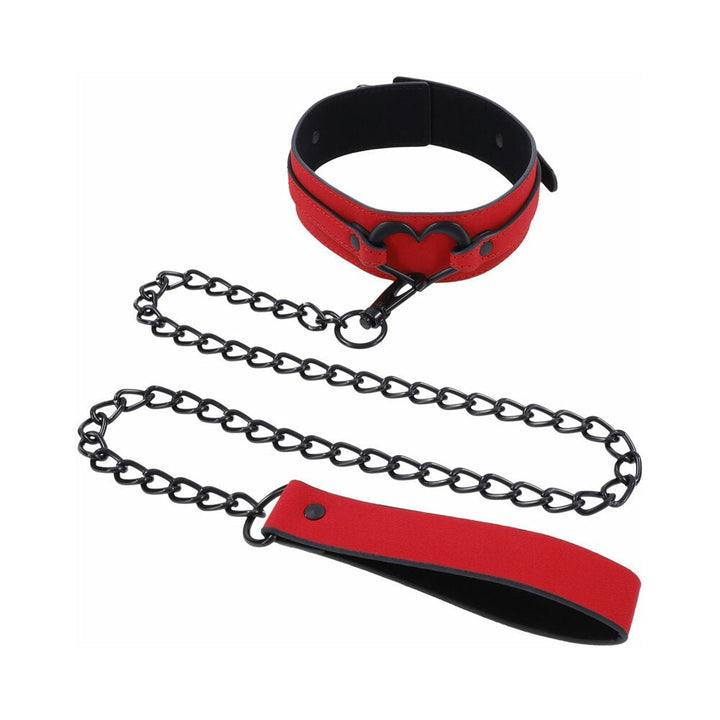 Red vegan leather collar with black heart-shaped metal detail and matching black chain leash with red handle.