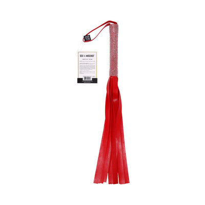 Red vegan leather flogger with sparkling rhinestone handle and wrist loop, featuring multiple soft falls and a product tag.