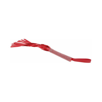 Red vegan leather flogger with sparkling rhinestone handle and wrist loop, featuring multiple soft falls.